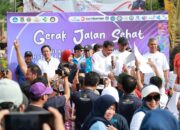 Bupati Tangerang Tebar Benih Ikan dan Lepas Peserta Gerak Jalan Sehat Peringati Enam Momentum Nasional